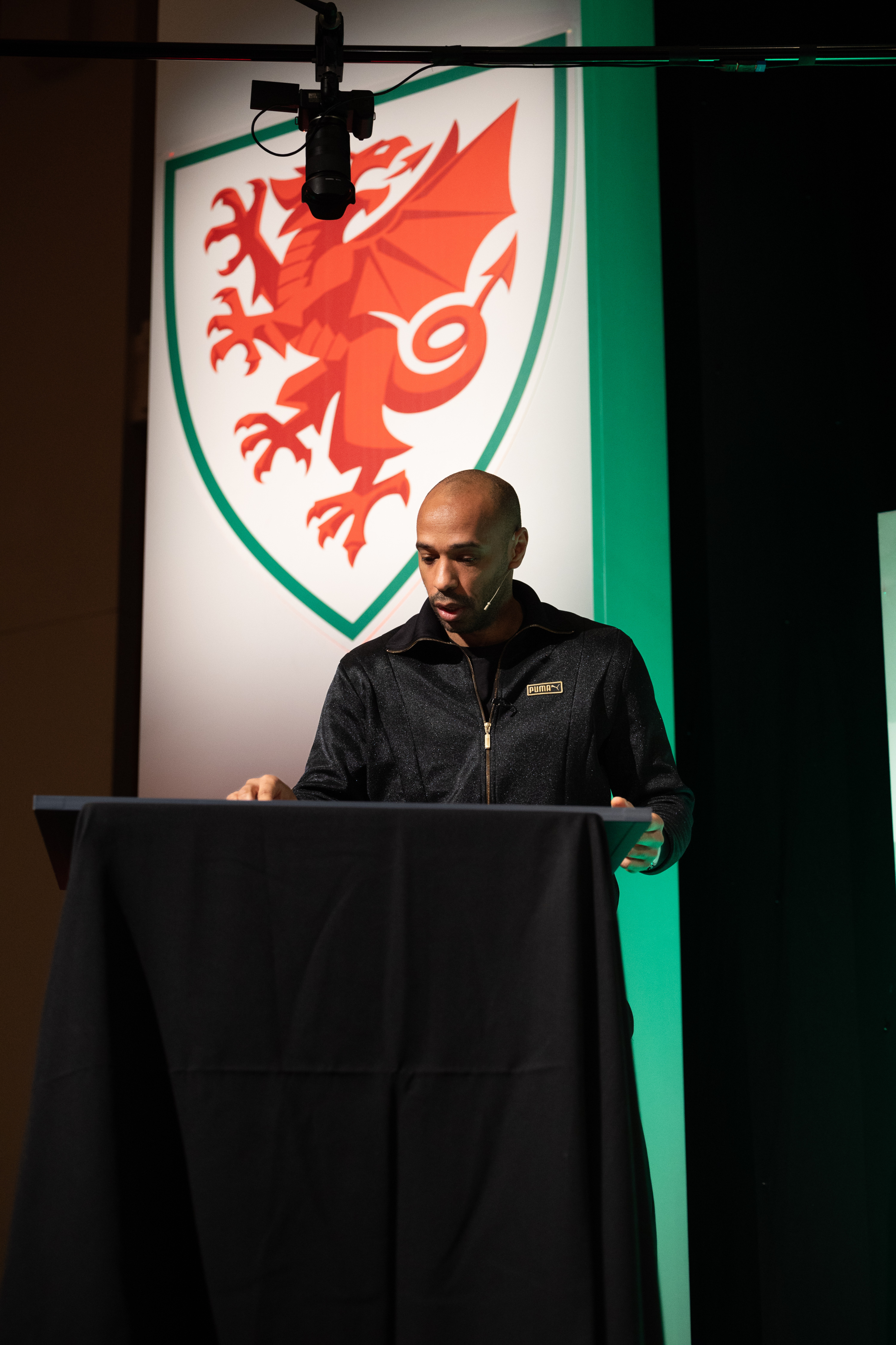 A coach presenting to an audience at an FAW coaching event
